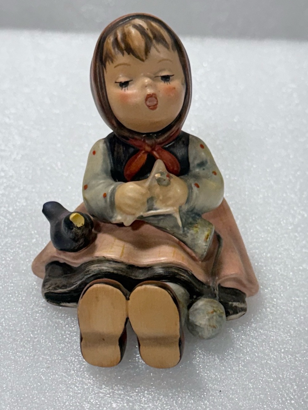 vintage Goebel Hummel figurine titled "Happy Pastime," numbered #69.